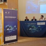 tre relatori durante la presentazione dei dati