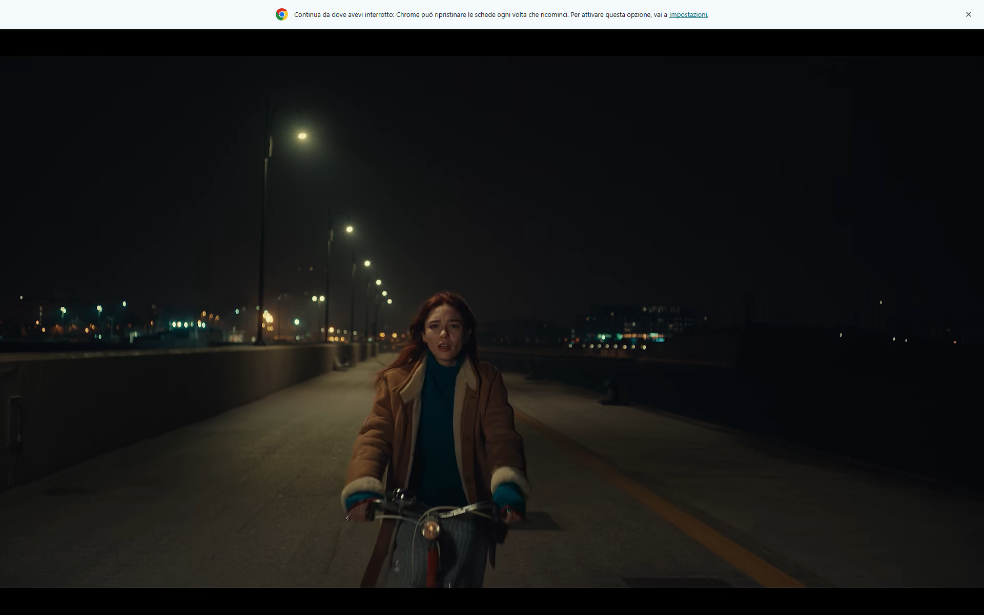 Una ragazza in bicicletta