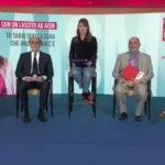 Persone sedute in una conferenza